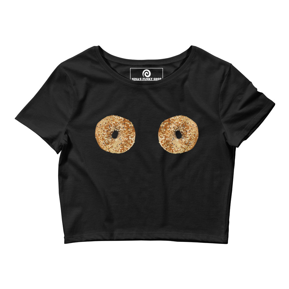 Black Bagel Boobs T-Shirt - Our Bagel Boobs Crop Tee is comfortable and perfect for everyday streetwear. It's a tight-fitting crop top with everything bagels, expertly printed on the front. Make a statement and eat your favorite bagels in this funny food t-shirt for bagel enthusiasts and foodies of all kinds.