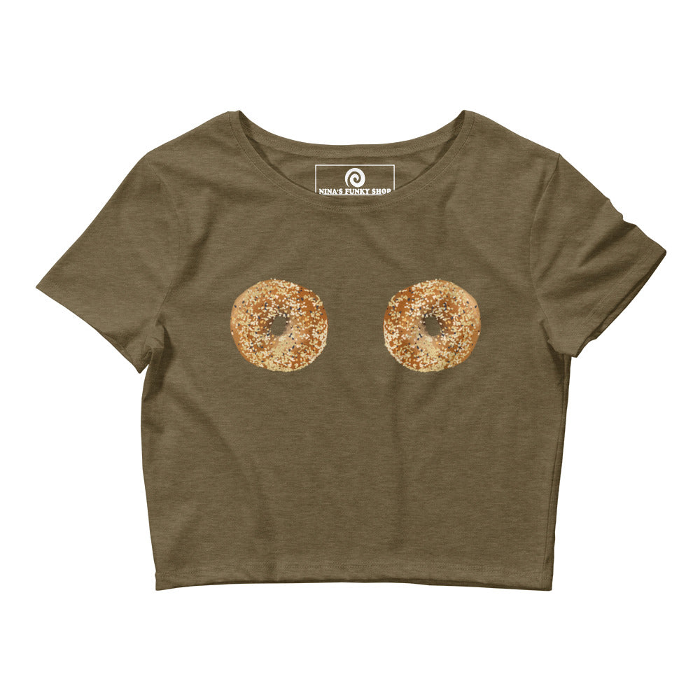 Green Bagel Boobs T-Shirt - Our Bagel Boobs Crop Tee is comfortable and perfect for everyday streetwear. It's a tight-fitting crop top with everything bagels, expertly printed on the front. Make a statement and eat your favorite bagels in this funny food t-shirt for bagel enthusiasts and foodies of all kinds.