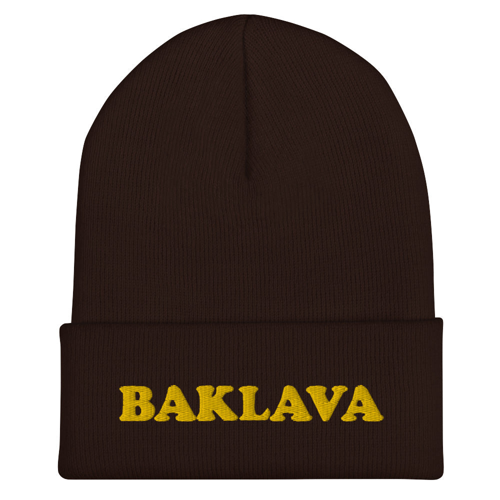 Brown baklava beanie -This baklava beanie hat is a classic fitted beanie with an funky yellow embroidery. It's a funny hat for foodies and baklava lovers. If you love weird hats or you're looking for a funny gift for foodies, we have the funky clothing and accessories for you. Stay funky in our unique streetwear and original funky designs. 