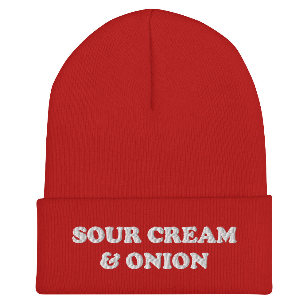 Red and white sour cream and onion beanie hat for winter. This sour cream and onion beanie hat is exactly what every chip lover needs. Eat your favorite chips in this funny food beanie. It's a unique beanie for foodies and a weird gift and for chip lovers and sour cream & onion enthusiasts. Celebrate your favorite chips in our sour cream and onion hat, and foodie clothing.