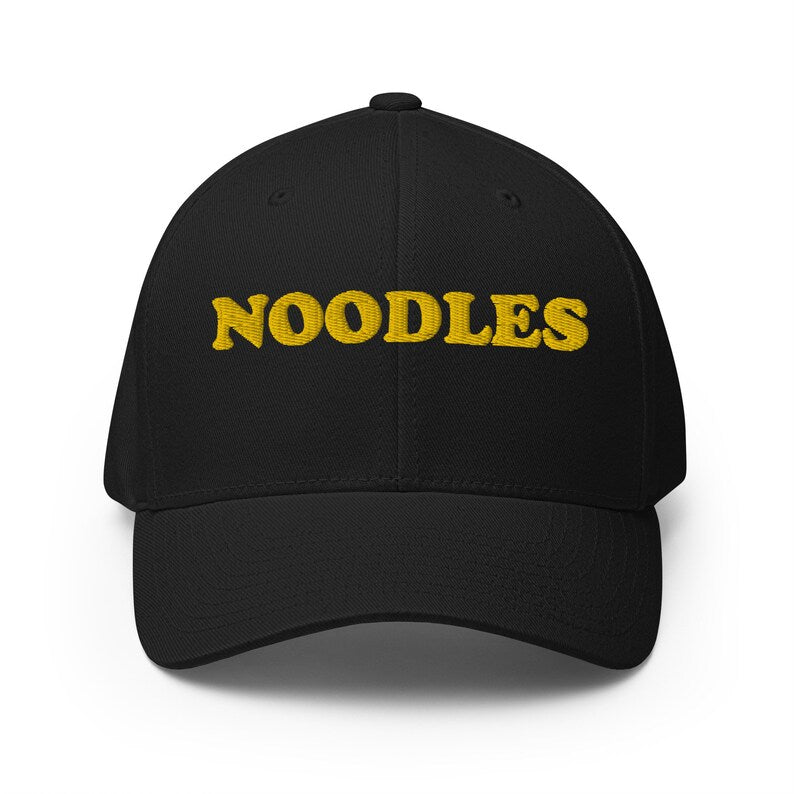 Black noodles hat for foodies -A funny statement hat for foodies and noodle lovers. It's a classic embroidered hat with the word noodles. This funny foodie hat is comfortable, unique and a perfect hat for noodle enthusiasts! Stay weird and eat noodles in this weird and unusual hat. It's a hat that's sure to get attention and maybe even noodles.