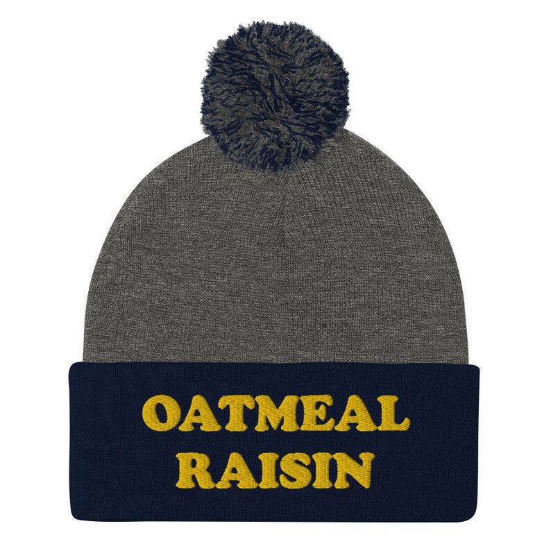 Navy and gray funny cookie lover oatmeal raisin beanie -Eat oatmeal raisin cookies in style with this funny foodie beanie. It's a unisex embroidered beanie that's perfect for cookie enthusiasts of all kinds. If you love oatmeal raisin, this weird foodie hat is a must have. Wear this warm and cozy hat it or give it as a funny gift for foodies and oatmeal raisin enthusiasts.