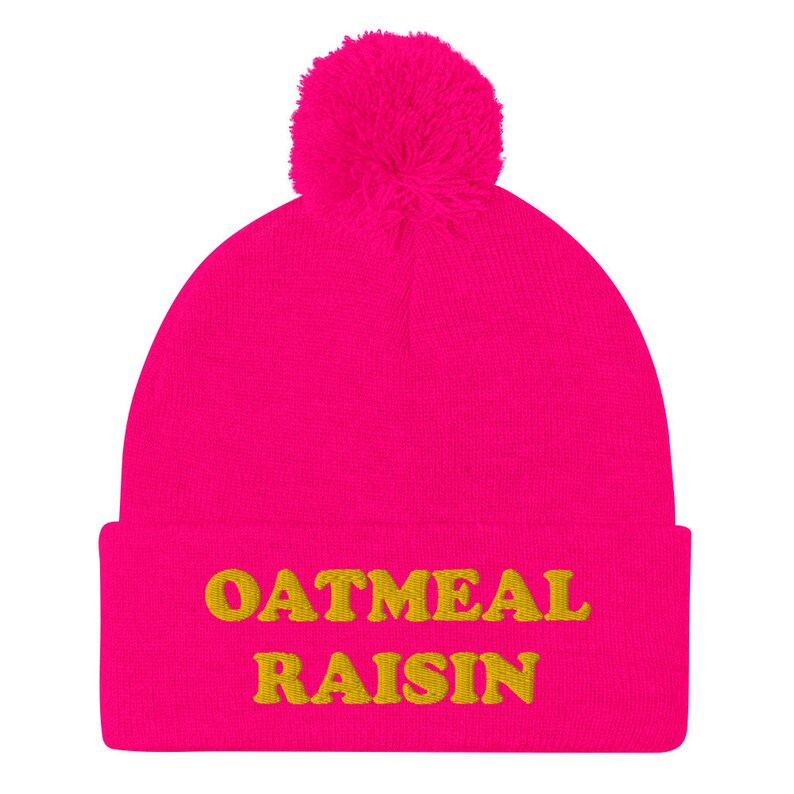 Hot pink oatmeal raisin beanie -Eat oatmeal raisin cookies in style with this funny foodie beanie. It's a unisex embroidered beanie that's perfect for cookie enthusiasts of all kinds. If you love oatmeal raisin, this weird foodie hat is a must have. Wear this warm and cozy hat it or give it as a funny gift for foodies and oatmeal raisin enthusiasts.