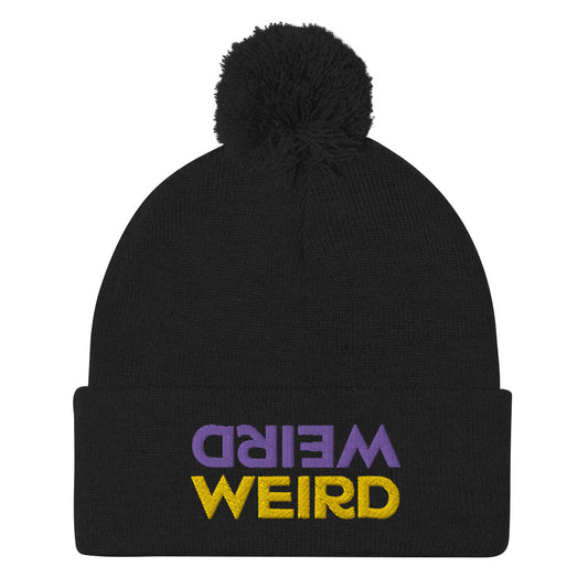 This 'weird weird' beanie is a cute, unusual, and cozy hat with a pom pom on top. Stay weird and be yourself in this weird and warm black hat with yellow and purple embroidery. Shop funky garlic hats, foodie beanies, weird vibes dad hats, graphic tshirts and more unusual shirts and hats. All original and unique designs.