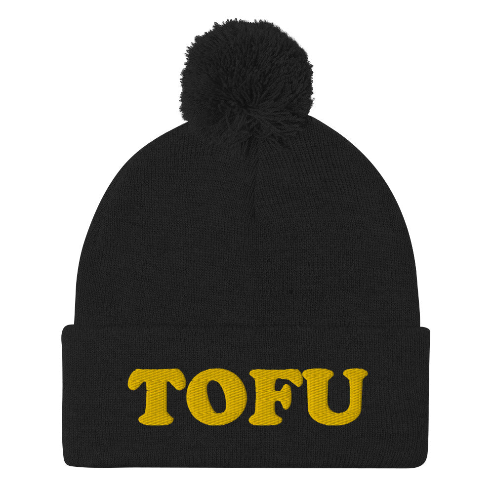 TOFU pom pom beanie for the animals, for the planet, for our health. It's a classic beanie that's warm, comfortable, funny and weird. This is a perfect hat for foodies and a unique gift for vegans and vegetarians that love tofu! Stand out and let your hat do the talking. Shop more funky foodie beanies and clothing.