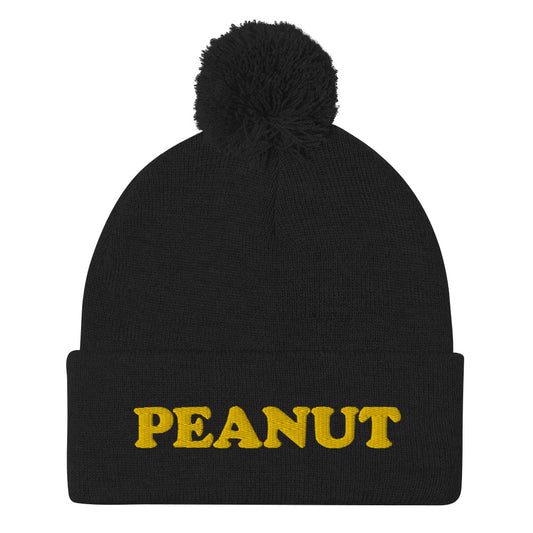 This "PEANUT" beanie hat is a perfect warm and cozy hat for cold weather. It's a classic beanie with a pom pom on top and a unique foodie embroidery. Our peanut beanie hat is part of our foodie clothing collection. Celebrate your favorite foods in our funky foodie beanies, weird hats, creative artsy hoodies, vegan tees and more