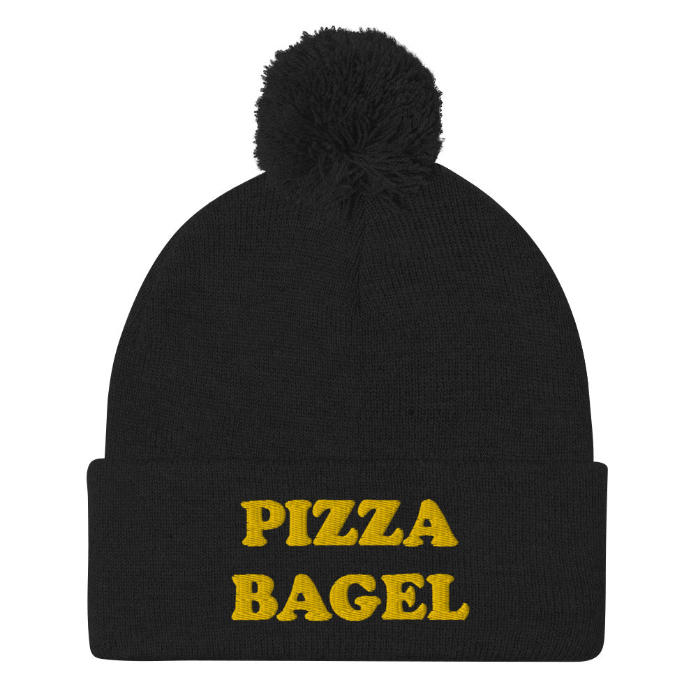 Black pizza bagel beanie hat - This pizza bagel beanie is funny, unique and just what every pizza bagel lover needs. It's a cozy beanie with a pom pom on top and a pizza bagel foodie embroidery. Our funky foodie clothing and accessories celebrate your favorite foods and things that bring you joy. Stay weird and wear what makes you smile.