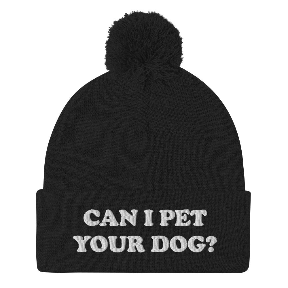 Can I pet your dog? Black beanie with white embroidery - Love petting dogs? Let your hat do the talking. This 'Can I pet your dog?' beanie is what every dog lover needs. It's a funny beanie with a unique embroidery to help you pet more dogs. This cozy pompom beanie is perfect for looking good and petting dogs. Stay weird in our funky animal lover clothing and accessories.