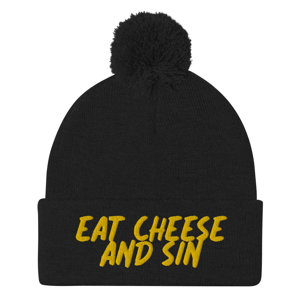 Black eat cheese and sun beanie hat for foodies - Eat cheese and sin beanie. It's a cozy beanie with yellow embroidery and a classic pom pom on top. This unique cheese lover beanie is a funny gift for foodies and a weird hat for everyday naughty cheese enthusiasts. Stay weird and celebrate your favorite foods and drinks in our funny foodie clothing and accessories.