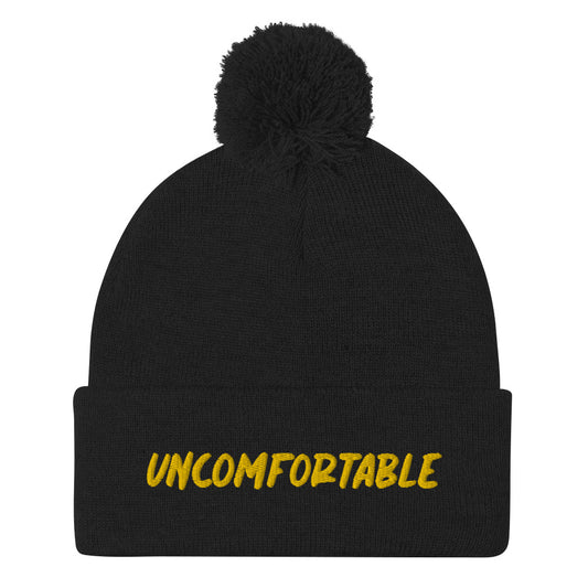 Black uncomfortable beanie with yellow embroidery - This uncomfortable beanie is cozy, warm and a perfect unique hat for introverts everywhere. It's a classic unisex embroidered beanie with a pom pom on top. This weird beanie is the perfect everyday street wear accessory and a funny gift for introverted friends and family. Stay weird and look cute in our funky apparel.