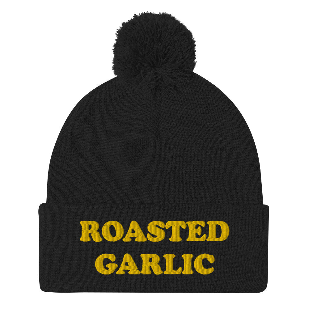 Black roasted garlic beanie. Is roasted garlic your favorite? This is just what you need. This roasted garlic beanie is the ideal accessory for garlic enthusiasts. It's a funny garlic hat to show off your love of food. Whether you're cooking or out on the town, this unique foodie beanie is cute, weird and just for you. Wear it out or give it as a funny garlic gift for foodies or your favorite garlic enthusiasts.