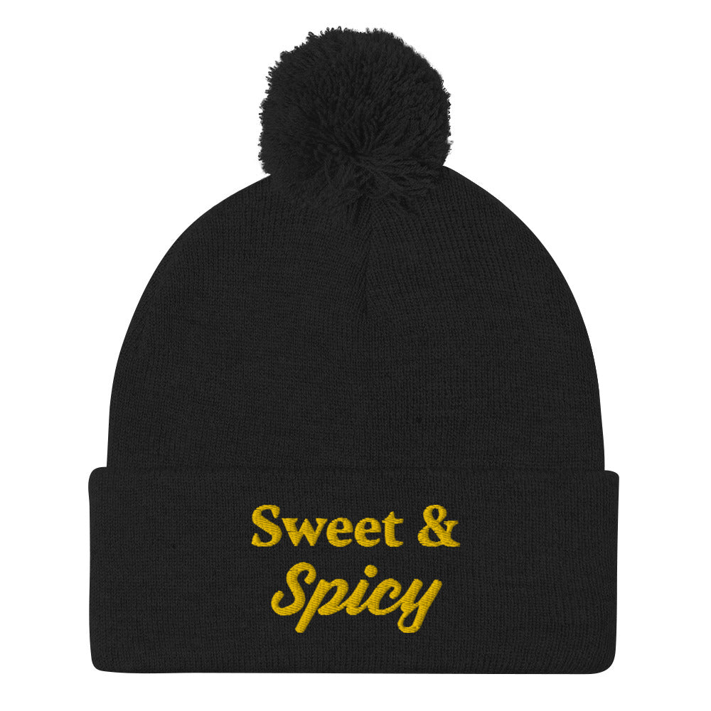 Black sweet and spicy beanie - Keep your head warm and look cute too in this Sweet and Spicy Beanie! It's the perfect warm and cozy foodie hat for cold weather that will add a little personality to your everyday style. Wear it in, out on the town, or gift it to your sweet and spicy friends. It's classic beanie with a pom pom on top and a unique embroidery. 