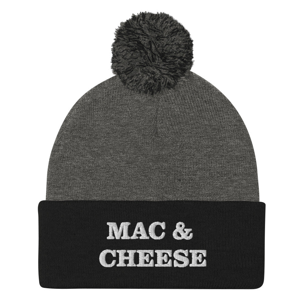 How much do you love mac and cheese? This "Mac and Cheese" beanie is a perfect warm and cozy hat for cold weather. It's a classic stylish beanie with a pom pom on top and a unique foodie embroidery. Ideal gift for people who love food and, of course mac and cheese. Shop funky and unique foodie beanies and clothing. 