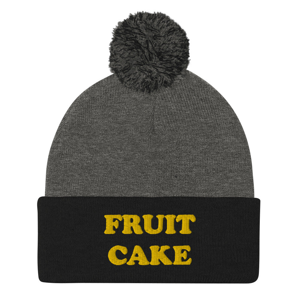 Do people like fruit cake? This weird beanie is a unique and quirky winter hat for holiday foodies and people who love fruit cake. It's a funny beanie with a unique yellow embroidery. The fruit cake weird holiday beanie is a perfect funny gift for foodies! Shop funny foodie beanies, weird hats, funky t-shirts and more.