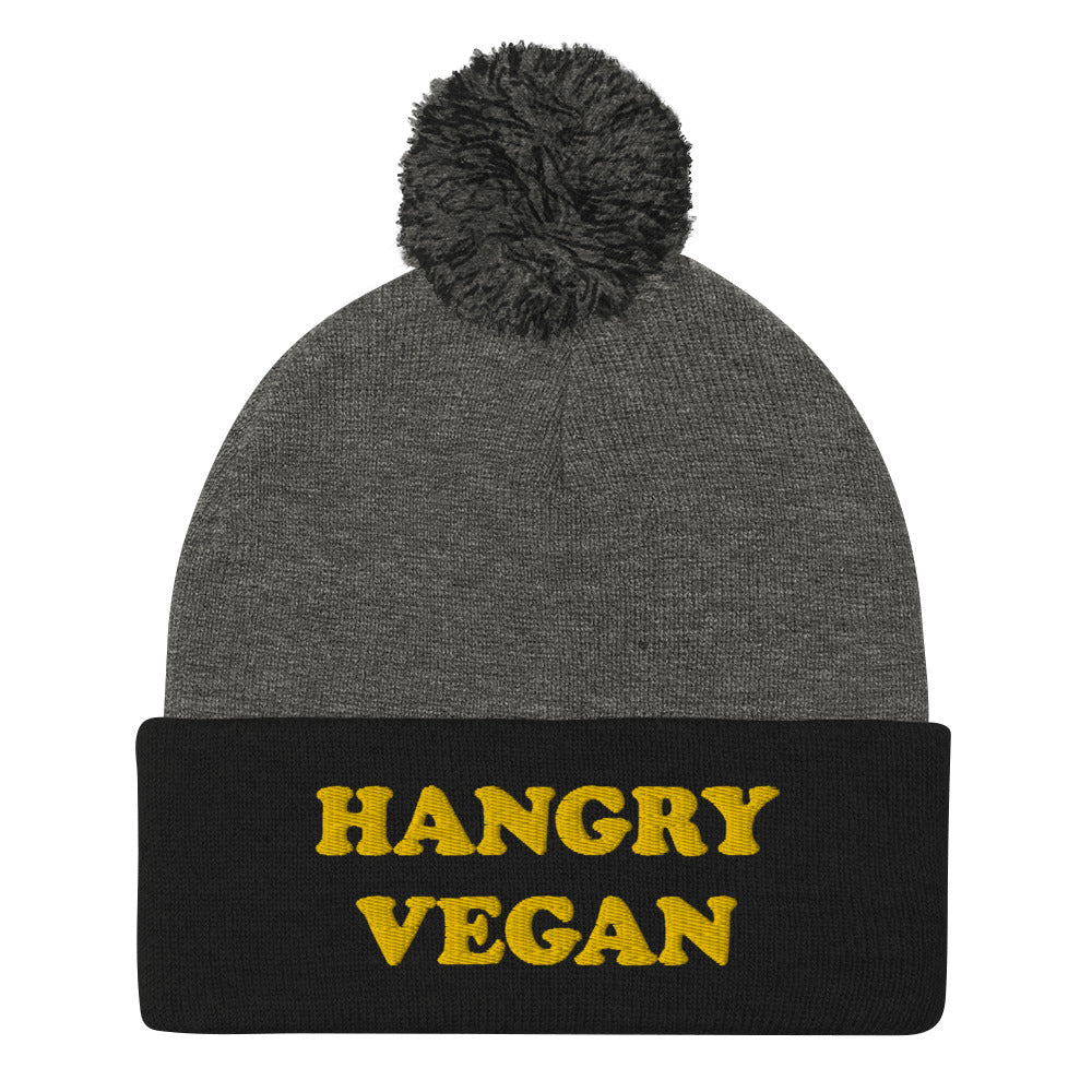 Are you a hangry vegan? This hangry vegan beanie is a unique vegan foodie beanie hat with a yellow embroidery. The hangry hat is a funny gift for vegans and plant based foodies. Shop funny animal lover beanies, foodie clothing, vegan graphic t-shirts, garlic hats and more. 