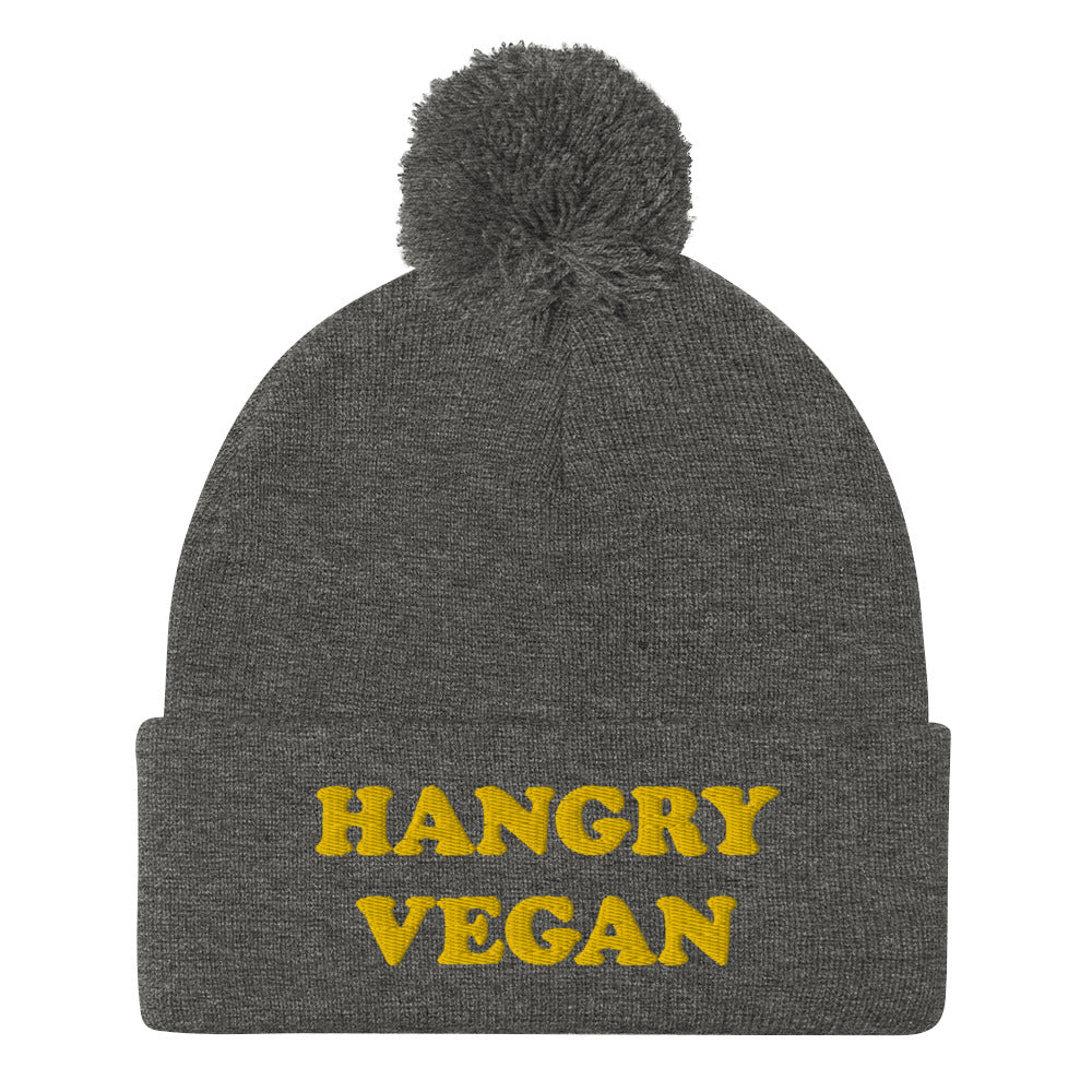 Are you a hangry vegan? This hangry vegan beanie is a unique vegan foodie beanie hat with a yellow embroidery. The hangry hat is a funny gift for vegans and plant based foodies. Shop funny animal lover beanies, foodie clothing, vegan graphic t-shirts, garlic hats and more. 