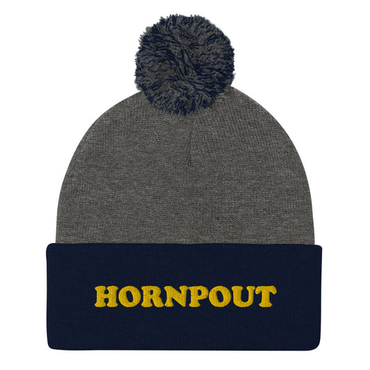 An embroidered "HORNPOUT" beanie with a pom-pom on top. This funky weird beanie is warm and cozy. It's a weird winter fishing hat that's unique & original. The hornpout hat is a weird beanie for fishing and a quirky street wear hat, too. Shop weird hats, funny beanies for foodies, and weird gifts for animal lovers. 