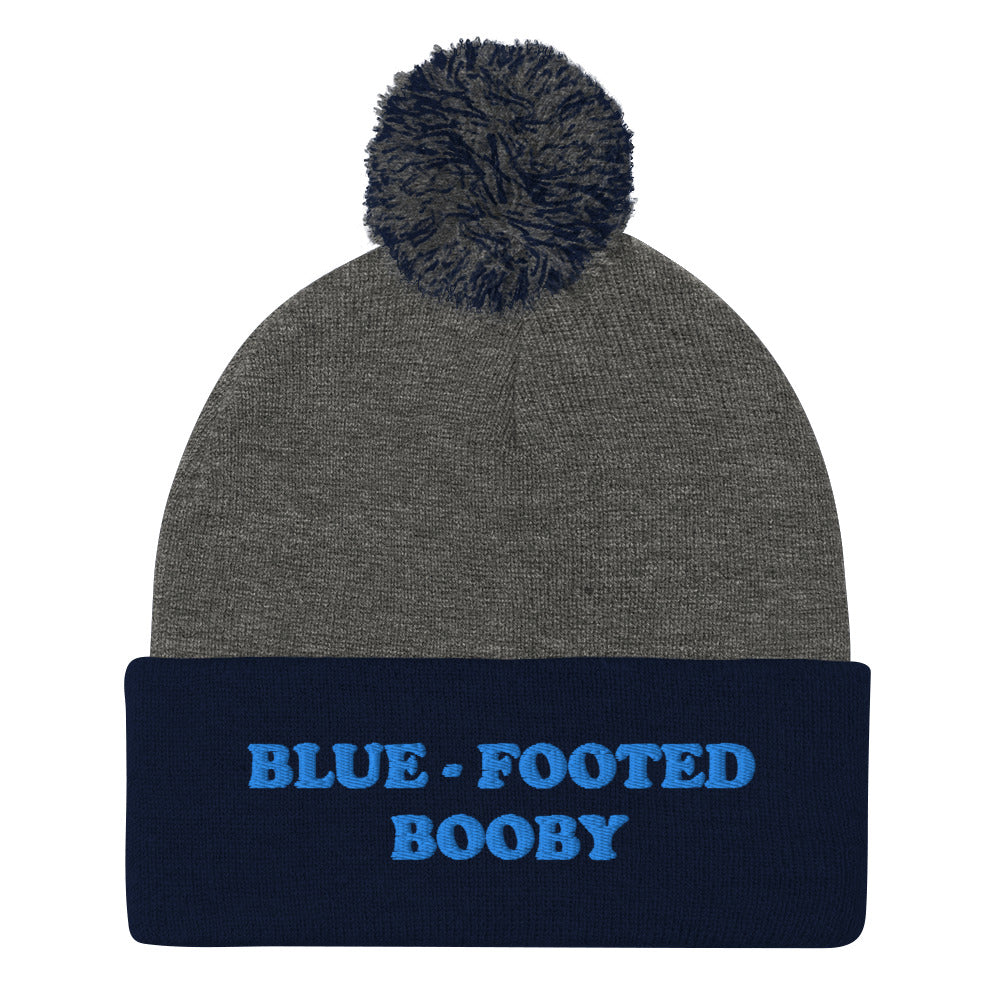 Is your spirit animal the blue-footed booby? This blue-footed booby beanie is a funny animal beanie with a blue-footed booby embroidery. This hat is a unique gift for animal lovers and blue-footed booby enthusiasts. Shop funny spirit animal beanies, foodie clothing, vegan graphic t-shirts, garlic hats and more. 