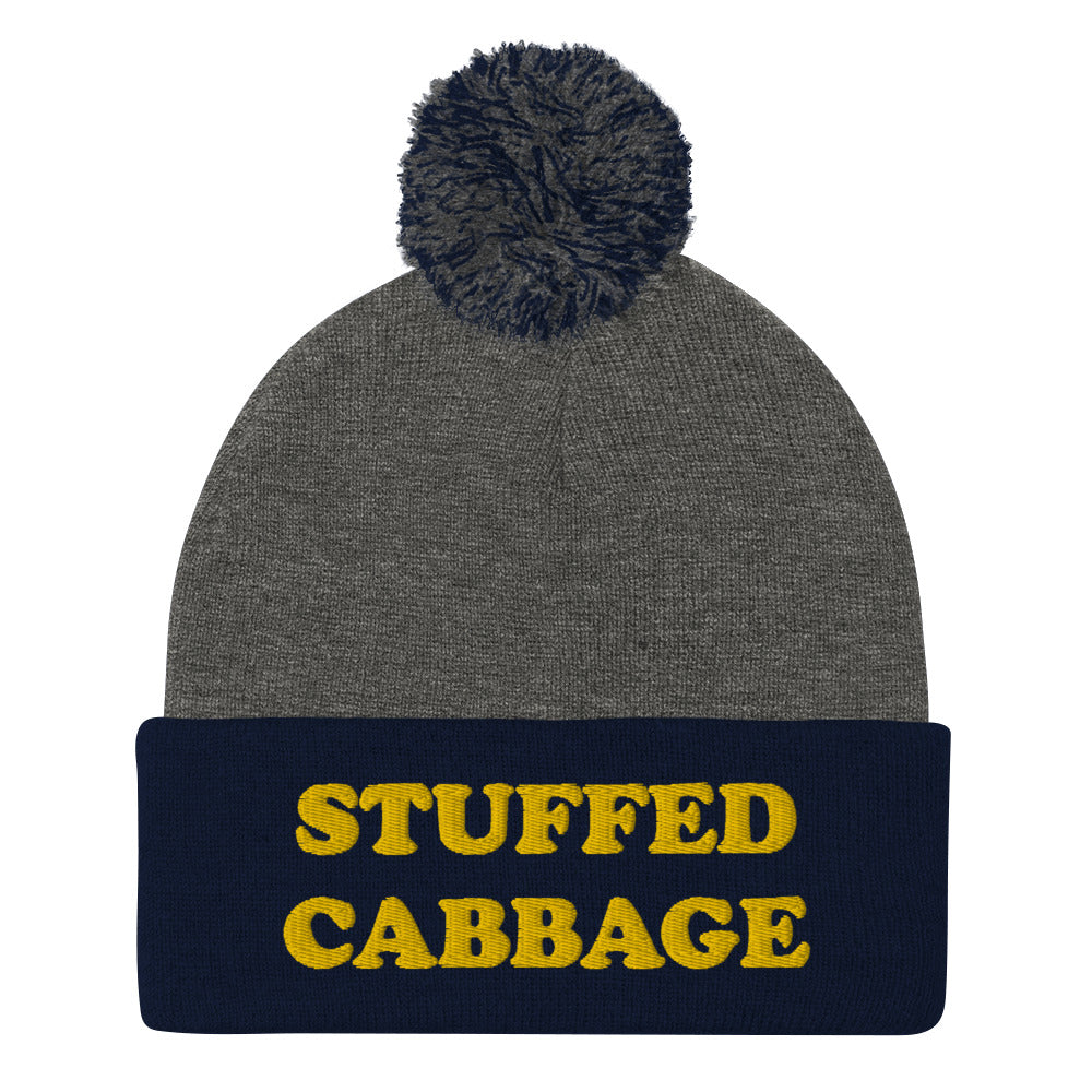 Funny beanie for foodies in navy blue and gray - This stuffed cabbage beanie is funny, comfortable and just a little weird. This unique foodie beanie is a classic beanie with a pom pom on top and a funny yellow embroidery. It's exactly what every funky hat lover, foodie and stuffed cabbage enthusiast needs. Eat stuffed cabbage in a funny and weird food beanie.