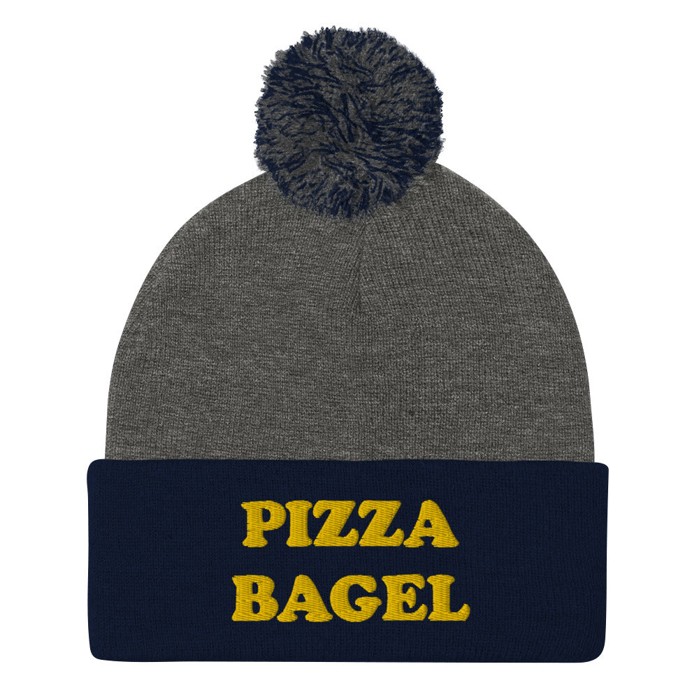 Gray and navy blue pizza bagel beanie hat - This pizza bagel beanie is funny, unique and just what every pizza bagel lover needs. It's a cozy beanie with a pom pom on top and a pizza bagel foodie embroidery. Our funky foodie clothing and accessories celebrate your favorite foods and things that bring you joy. Stay weird and wear what makes you smile.