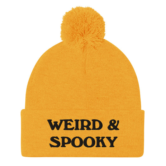 Yellow and black weird and spooky beanie - Stay weird and spooky in this classic beanie with a pom pom on top. It's cute and cozy and just a little weird. So, celebrate your weirdness and individuality in our funky clothing and accessories. Be weird, be spooky, and be yourself in these colorful and unique beanies. 