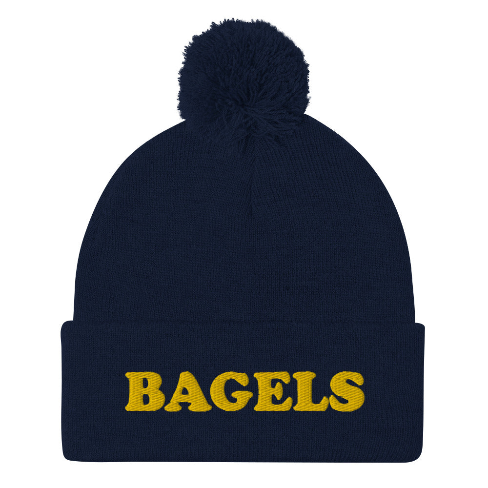 Do you love bagels? Everyone loves bagels and every needs an original "Bagels" Pom-Pom Beanie. This funky foodie beanie is a perfect warm and cozy hat for cold weather. It's a classic beanie and a unique bagel embroidery. A unique gift for bagel lovers and foodies of all kinds. Shop more unique bagel and foodie beanies!