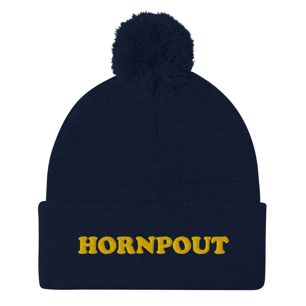 An embroidered "HORNPOUT" beanie with a pom-pom on top. This funky weird beanie is warm and cozy. It's a weird winter fishing hat that's unique & original. The hornpout hat is a weird beanie for fishing and a quirky street wear hat, too. Shop weird hats, funny beanies for foodies, and weird gifts for animal lovers. 