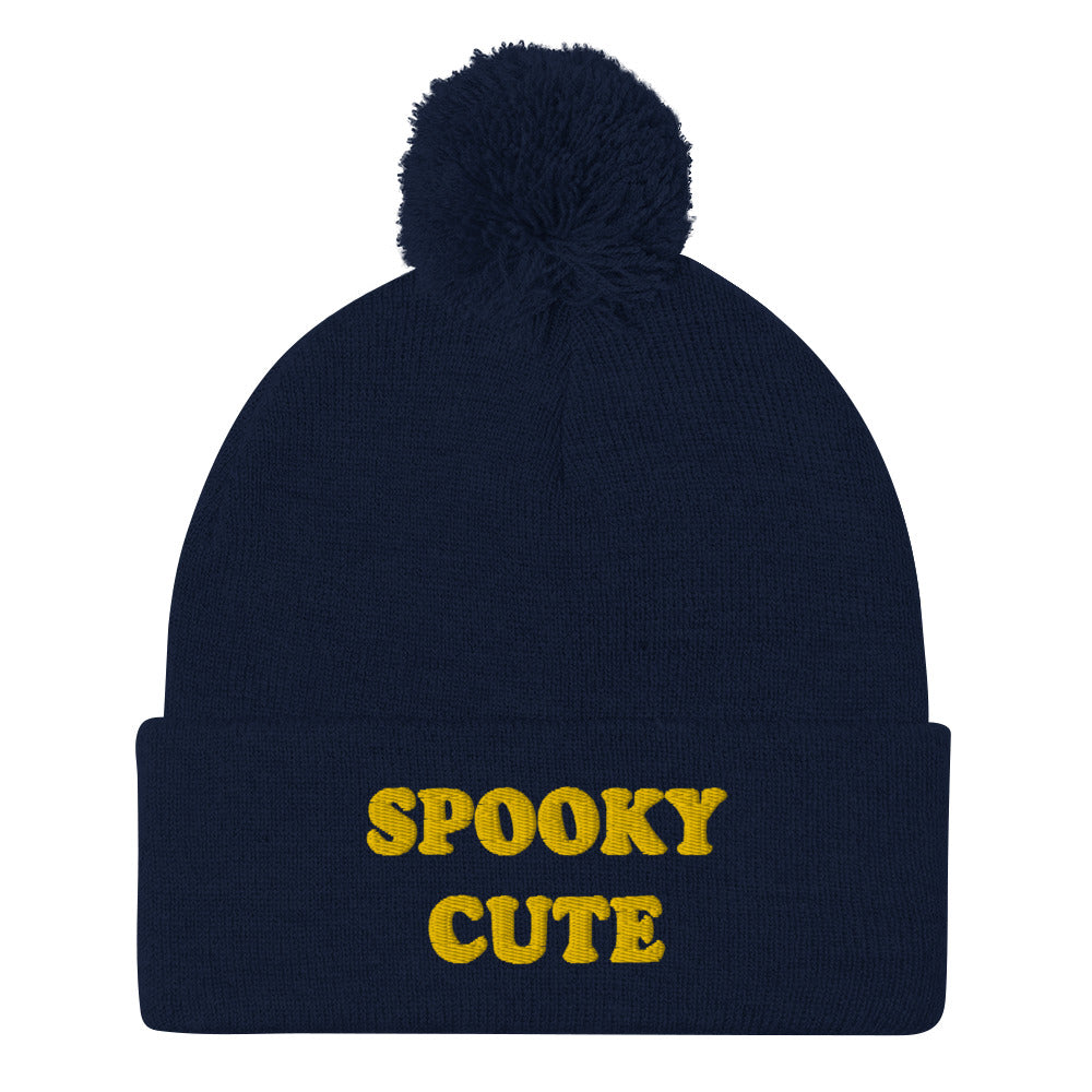 Navy blue spooky cute pom pom beanie - When it's spooky how cute you are. This cozy unique embroidered beanie has a classic winter style, with a pom pom on top and a spooky cute design. Keep warm and look cute while embracing your spooky side. Wear this unisex funny beanie for everyday streetwear or give it as a cute gift for spooky loving friends.