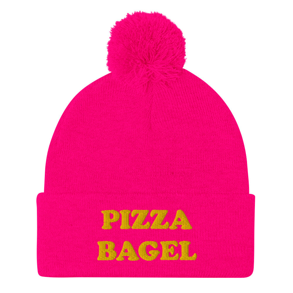 Hot pink pizza bagel beanie hat - This pizza bagel beanie is funny, unique and just what every pizza bagel lover needs. It's a cozy beanie with a pom pom on top and a pizza bagel foodie embroidery. Our funky foodie clothing and accessories celebrate your favorite foods and things that bring you joy. Stay weird and wear what makes you smile.