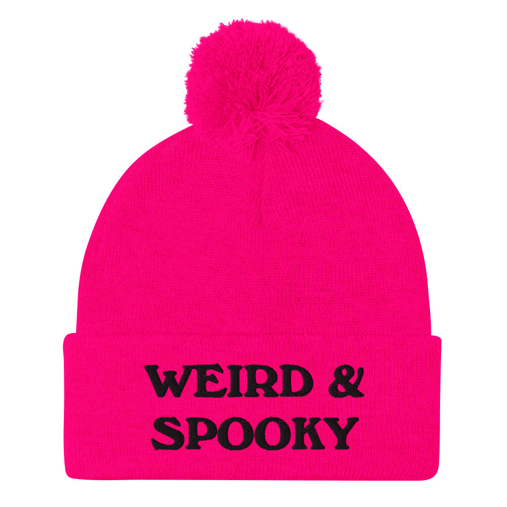 Pink and black weird and spooky beanie - Stay weird and spooky in this classic beanie with a pom pom on top. It's cute and cozy and just a little weird. So, celebrate your weirdness and individuality in our funky clothing and accessories. Be weird, be spooky, and be yourself in these colorful and unique beanies.  