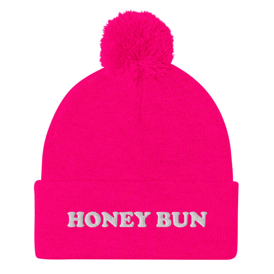 Hot pink honey bun beanie - Honey Bun Pom-Pom Beanie. This cute foodie beanie is a perfect warm and cozy hat for cold weather. It's a classic beanie with a pom pom on top and unique white embroidery. The funny honey bun hat is a weird foodie hat that's a perfect gift for foodies and honey bun lovers.  Stay warm in our funky foodie clothing.