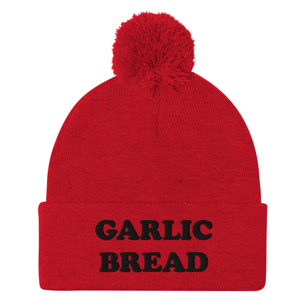 Red and black garlic bread beanie hat - This garlic bread beanie is a perfect warm and cozy hat for cold weather. Everyone loves garlic bread and now you can eat it in a classic beanie with a pom pom on top. Stay funky in this weird hat for foodies and garlic bread enthusiasts. It's funny, unusual and sure to get attention from your garlic loving friends.