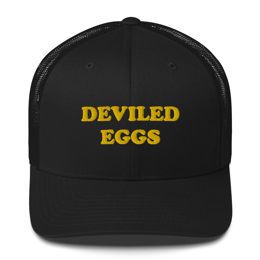 Finally you can eat your favorite deviled eggs in a classic deviled eggs trucker hat. This "DEVILED EGGS" hat is a funny and weird trucker hat for foodies everyday. It's a perfect weird gift for foodies. Wear your favorite foods in our funky foodie clothing. Shop funny foodies hats, weird beanies, unique foodie clothing, and more.