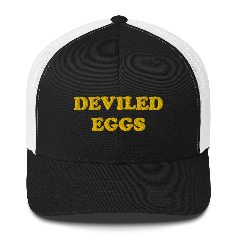 Finally you can eat your favorite deviled eggs in a classic deviled eggs trucker hat. This "DEVILED EGGS" hat is a funny and weird trucker hat for foodies everyday. It's a perfect weird gift for foodies. Wear your favorite foods in our funky foodie clothing. Shop funny foodies hats, weird beanies, unique foodie clothing, and more.