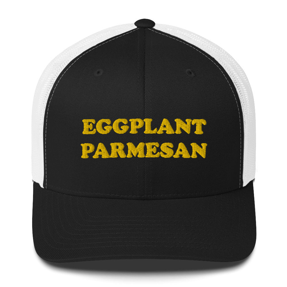 Black and white trucker hat for eggplant parmasan enthusiasts - This Eggplant Parmesan Trucker Hat features a unique design with a food lover embroidery that any foodie is sure to love. Inspired by the classic Italian dish, this unisex trucker hat is perfect for anyone looking for a funny gift for eggplant parmasan lovers. Celebrate your favorite foods in our funky foodie apparel.