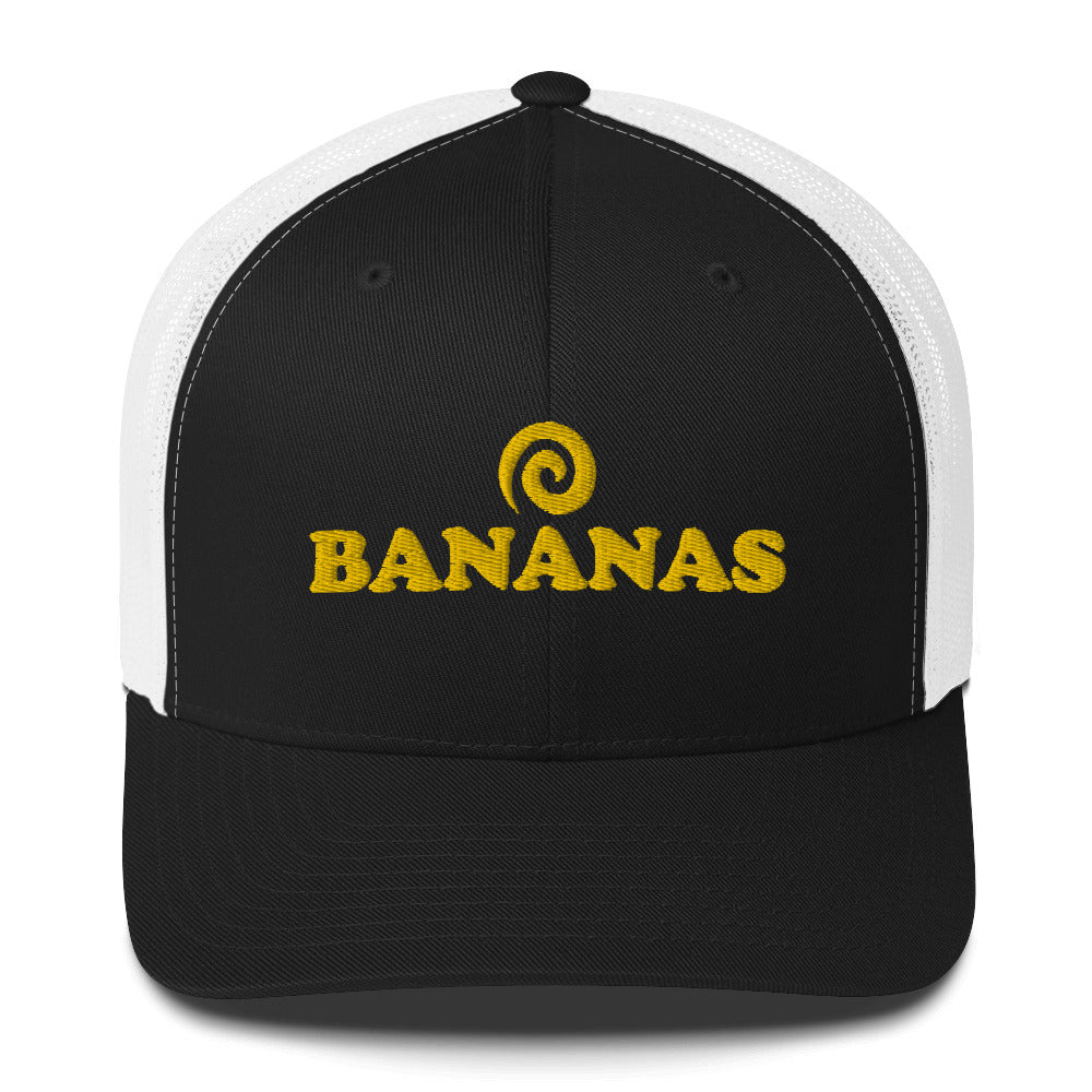 Black and white bananas hats -This Bananas trucker cap is a classic foodie hat for everyday with a unique banana lover embroidery. It's a comfortable and funny foodie trucker hat with a mesh back. Wear this weird trucker hat as an everyday accessory for banana lovers or give it as a unique gift for banana enthusiasts. This trucker hat is bananas.