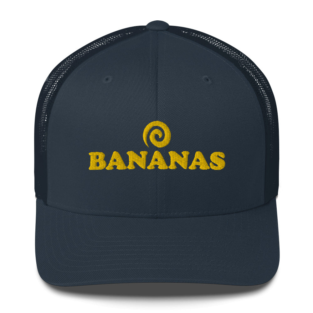 Navy blue bananas trucker hat for foodies - This Bananas trucker cap is a classic foodie hat for everyday with a unique banana lover embroidery. It's a comfortable and funny foodie trucker hat with a mesh back. Wear this weird trucker hat as an everyday accessory for banana lovers or give it as a unique gift for banana enthusiasts. This trucker hat is bananas.