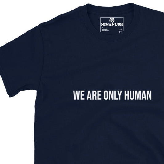 Navy blue unisex t-shirt for adults - This We Are Only Human t-shirt is made from 100% ring-spun cotton, making it soft and comfortable. It's a simple t-shirt with a humble message. Perfect for everyday street wear and made just for you. A t-shirt with a meaningful message that's a reminder of humanity's ability to be kind, compassionate and resilient.