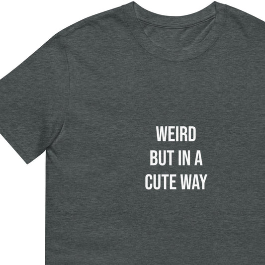 Gray weird but cute t-shirt for cute adults - This Weird but in a Cute Way T-Shirt is a perfect everyday tee. It has a simple design on the front that celebrates individuality and being a little weird. Stay weird and look cute in this classic t-shirt or give it as a weird gift for anyone. It's designed to keep you comfortable and stylish - or just a little weird.