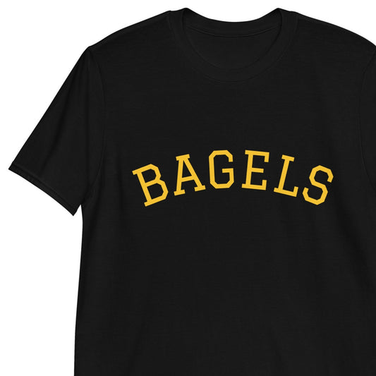 Black bagel t-shirt for foodies - This classic bagels t-shirt is simple and to the point. Every bagel lover needs a bagel t-shirt. Eat bagels in style this bagel season in your new trendy bagel t-shirt or give this funny bagel shirt as a unique gift for the bagel lover in your life. It's a weird t-shirt for foodies that is sure to make a statement.