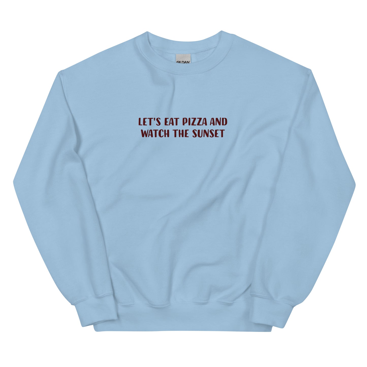 Light blue embroidered sweatshirt for pizza lovers and sunset enthusiasts - Let's eat pizza and watch the sunset. This funny foodie sweatshirt is original, comfortable and made just for you. A unique embroidered sweatshirt for pizza lovers. It's the perfect weird sweatshirt for foodies, sunset chasers and pizza enthusiasts. Stay weird and celebrate your favorite foods in our funky foodie clothing.