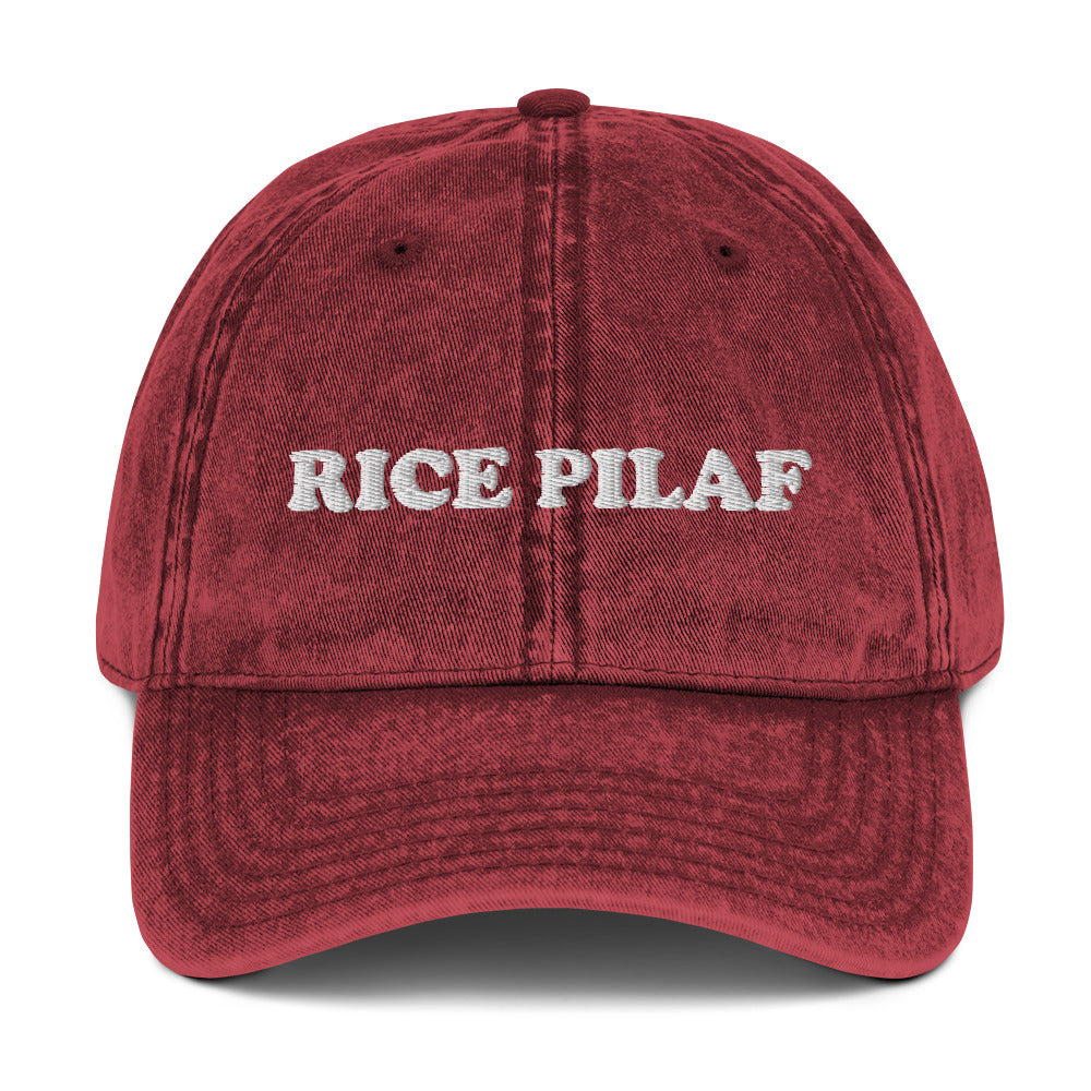 Red vintage dad hat for rice pilaf lovers - This rice pilaf dad hat is the perfect foodie accessory for every day. The vintage-style hat is unique and weird, making it a funny gift for foodies, ideal for the rice lover in your life. The adjustable back ensures the perfect fit and is great for everyday style. Wear it, love it, and make a statement in this foodie hat.